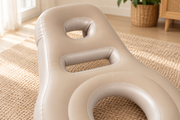Close-up of the head section of the beige maternity cushion