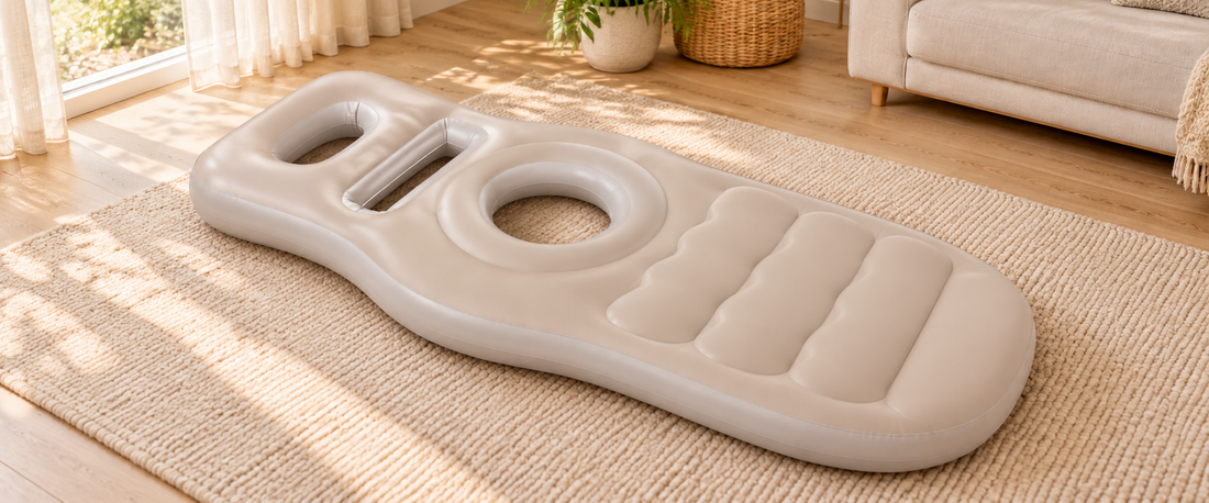 The full beige maternity cushion in a bright living room